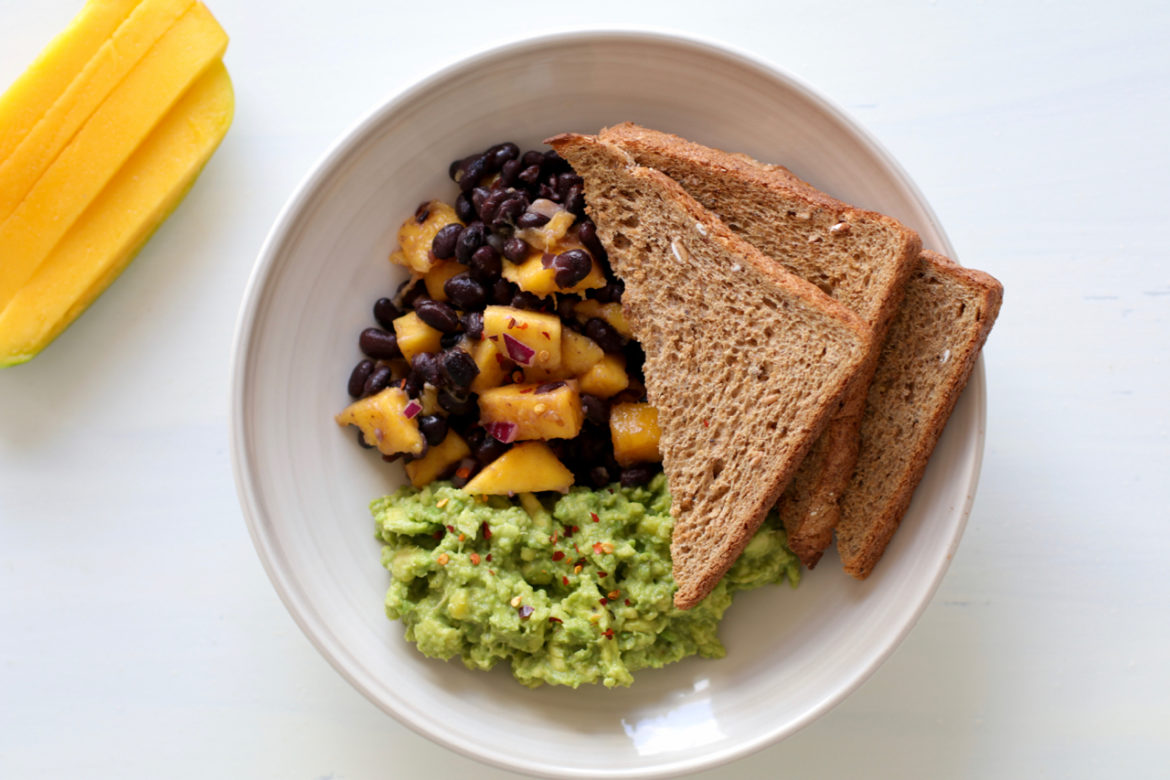 Breakfast toast with avocado and bean salsa